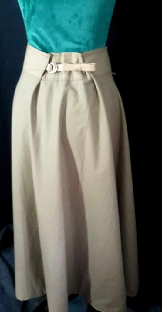 Dos avec patte de serrage